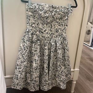 NWOT. Women’s baby doll strapless dress black and white floral print. Size S